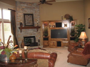 Sweetwater Creek New Homes in Spring Hill, KS Living Room with Stone Fireplace